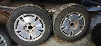 full set of all season tires and aluminum rims off a 2009 Honda civic. excellent condition 1 seasons...