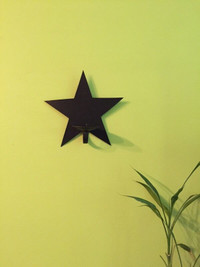 Black Star wall mounted candle holder