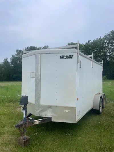 14 foot enclosed cargo trailer. Ramp rear door. Side entry Two 3500lb axles Tires in great shape. Cu...