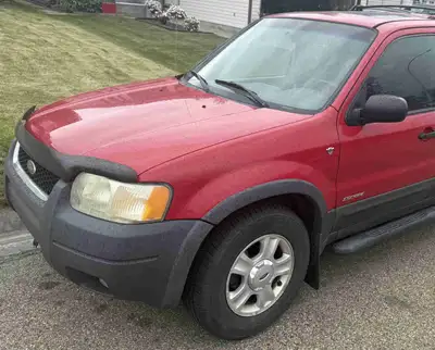 2002 Ford Escape 3L V6 XLT Lady Owner(Original Owner) This escape comes with: remote start, 3 sets o...