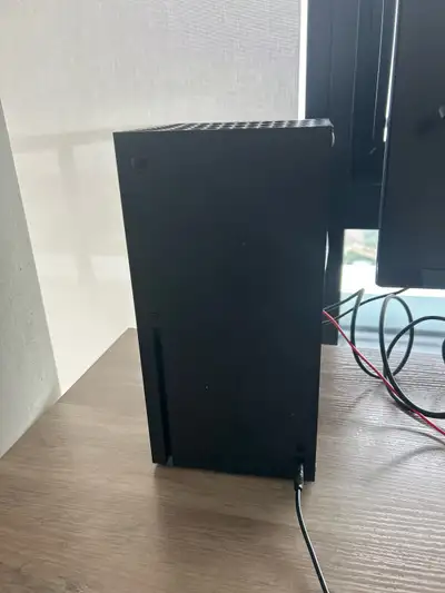 Xbox series X with monitor and headset, View more