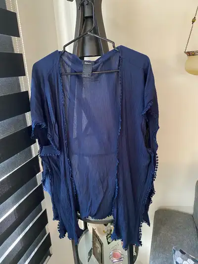 White and blue kimonos . Used good!, View more