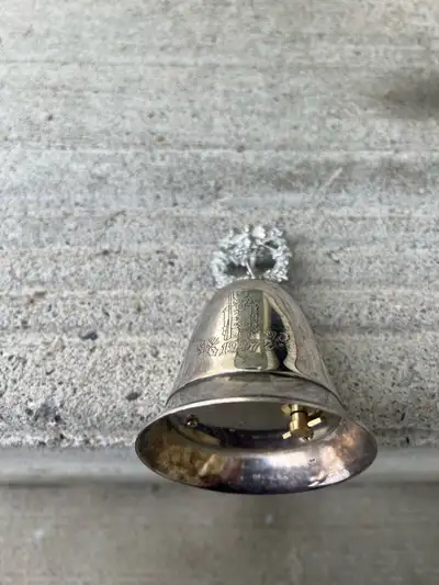 “Lenox” 1997” Silver Plate Bell. It plays “Nutcracker Dance of the Sugarplum Fairies”. It has been s...