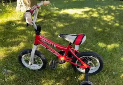Excellent condition 12" kids bike (Nakamura Adventure) with training wheels. Barely used as he did n...