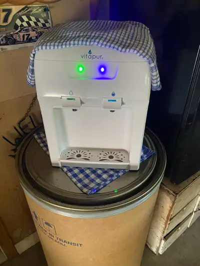 For sale counter top water cooler was bought paid 100 only used lightly by one person for a month,gr...