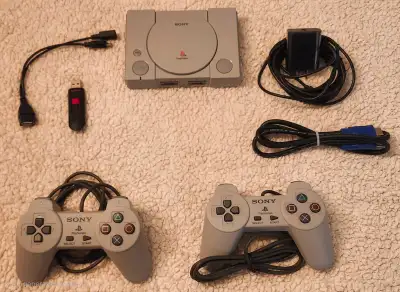 Awesome PlayStation console bundle! You get the Sony PlayStation classic mini console, two controlle...