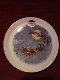 2 small Santa Clause plates...