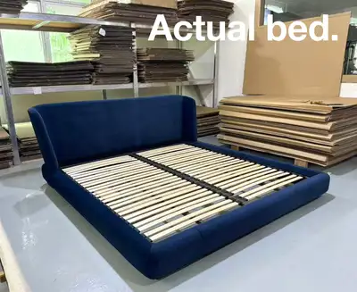 King-sized bed [roughly 76x80”], material is a deep royal blue velvet. Condition is BRAND NEW, still...
