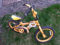 $35.  yellow boys bicycle ages 3-7 good condition