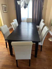Large table and 8 chairs, well used, best offer