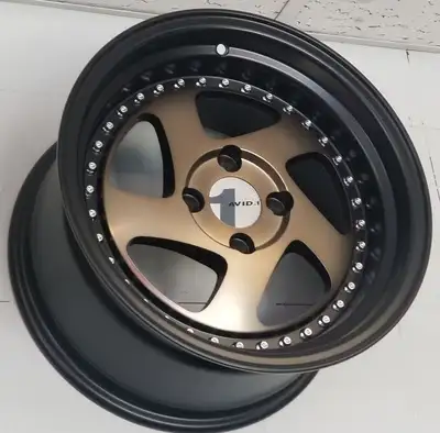 New AV-19 Bronze 15x8 +25 73.1 Conical 4X100 $ 950 plus hst per set of 4 rims NEW tires additional C...