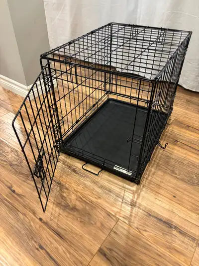 This is a used dog crate. It is in very good condition. It has one door. It is clean. It measures ap...
