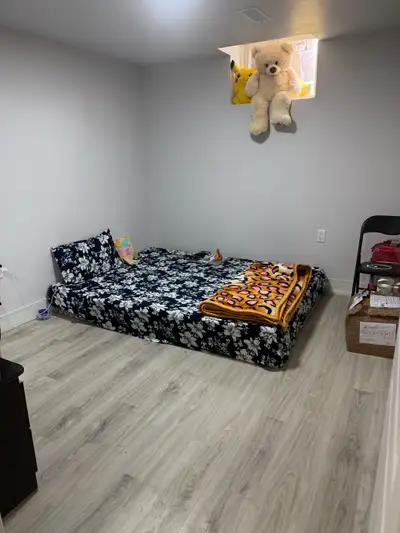 one room available in two bedroom basement
