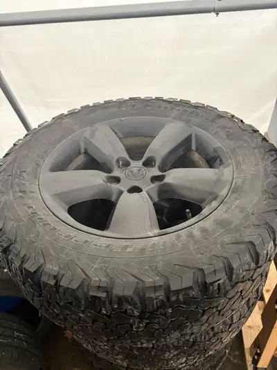 From 2021 ram classic. LT285/60R20 BFG KO2 in great shape between 6.5-7mm. Wheels in great shape wit...