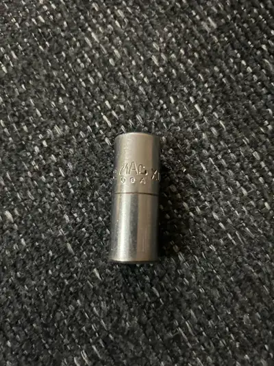This is a MAC Tools socket, perfect for any mechanic or DIY enthusiast. As you can see it's been use...