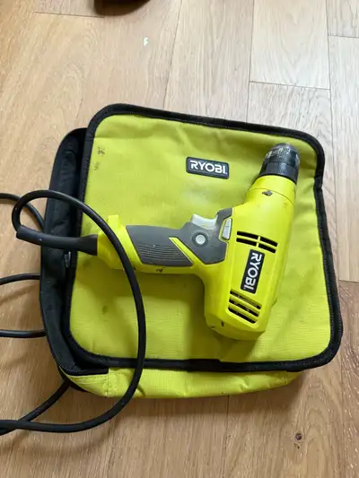 This is a used Ryobi drill with its carrying case. It is in good working condition, perfect for conc...