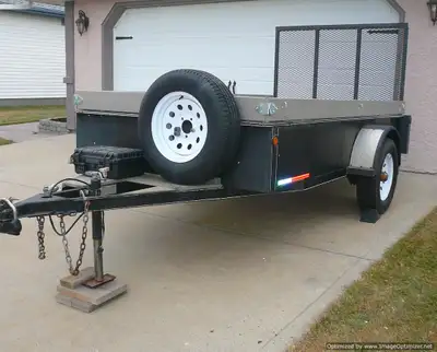 5ft x 10ft bed, overall length ~14ft; enclosed 3 sides, GAWR 2990LB, trailer weight 1000lb, Net Load...