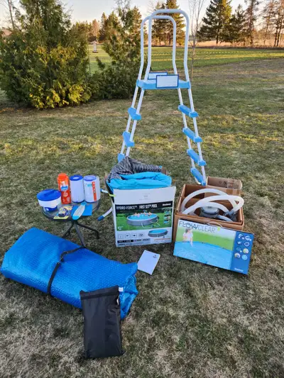 13 ft bestway swimming pool. 33" deep. Includes filter pump and manual. Extra accessories included:...