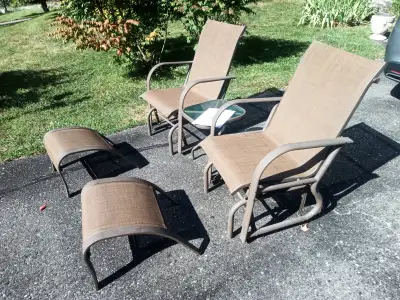 5 piece outdoor set by HomeStyles, high back glider chairs, glass table just like new ,save 200 doll...