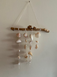 Seashell and driftwood wall art hanging