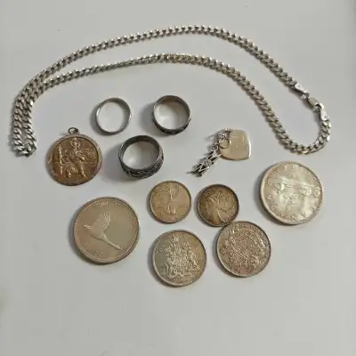 silver jewelry and coins, View more