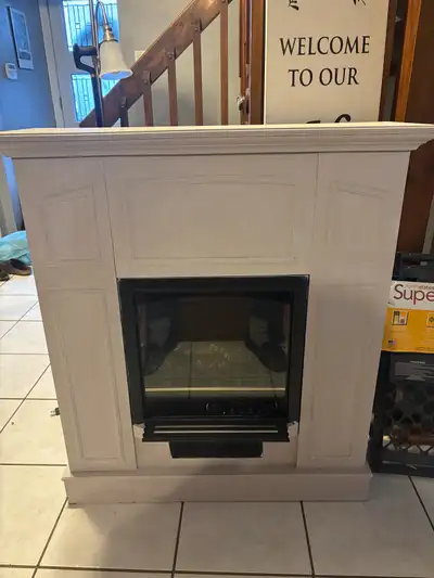 Electric fireplace. Warms very well! Smaller in size: approx 3 ft wide and 1 foot in depth. Height i...
