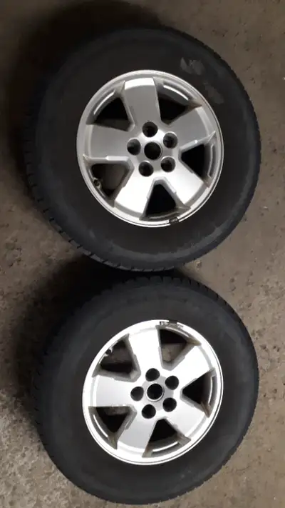Selling two 2012 Ford Escape XLT 16” original rims with sensor in good condition. no scratch no defo...