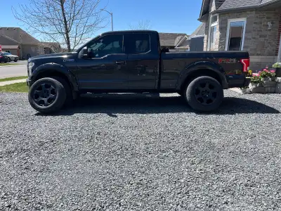 Set of 275 60 r 20 bf good rich all terrain tires on rims. Good tread, no patches. Rated for snow. A...