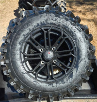 27in. Dirt Digger tires on 14in. Maxx aluminum rims 