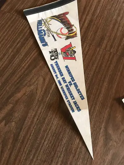 Winnipeg Goldeyes vs Thunder Bay Whiskey Jacks pennant. Approximately 9” high by 24” wide. August 3,...
