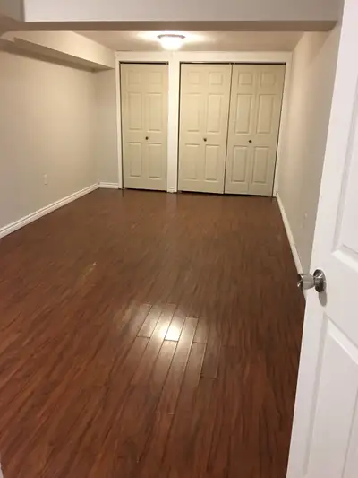 Large, sun-filled room in a clean basement apartment, ideal for a single student or working professi...