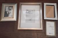 4 silver picture frames - metal & plastic - different sizes