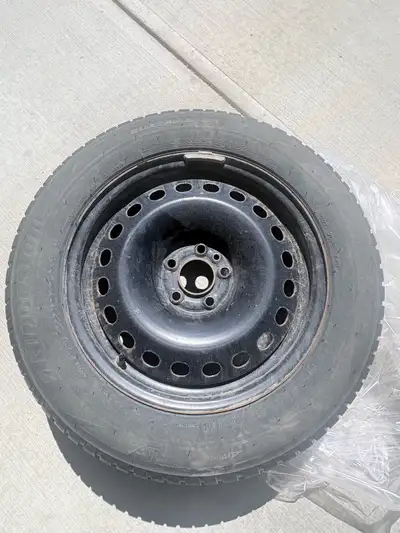 Selling a complete set of 4 Bridgestone Blizzak winter tires mounted on black steel rims Tire Size:...