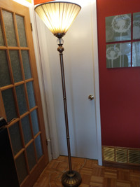 Torchiere style floor lamp.