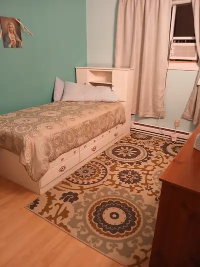 Fully Furnished Room with bedding, includes access to shared kitchen, living room, dining room, laun...