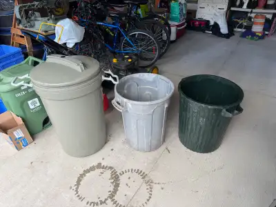 3 used garbage cans, View more