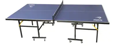 Table tennis table with wheels. It comes with net, paddles and the ping pong balls. Good as new plea...