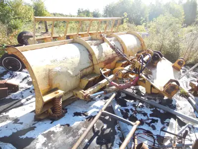 Snow blade, was on a 544 G John Deer Loader