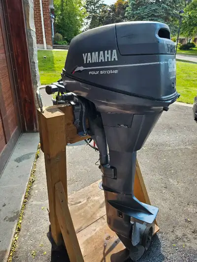 Yamaha 9.9 Four Stroke High Thrust outboard. Long shaft, electric start, manual tilt/trim. Remote op...