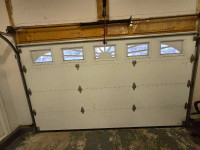 Insulated electric garage door 12x7 