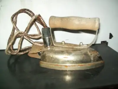 Antique electric iron. Made in Renfrew! Great display piece for a sewing shop. The cord removes for...