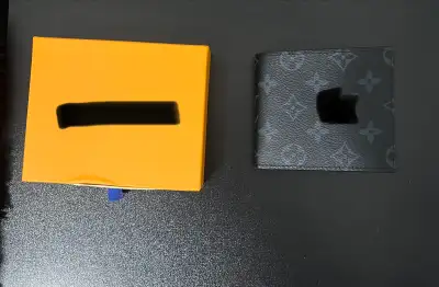 Brand new black wallet, clean and stylish design. Good quality material, perfect for everyday use. M...