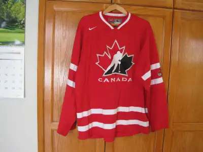 Hockey Jerseys ; Canadian Olympic Hockey team 2002 men's size large. . Sturgis Trash 71, size large...