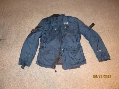 SPYKE motorcycle jacket for sale very good condition size large color blue with full armor which can...