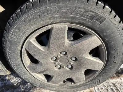 Selling my Winter tire on rim like new 215/60R16 for Chevy Cruze and 2011 4 tires on black rim , in...