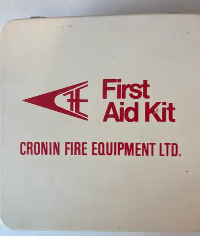 Keep your medical supplies organized with this vintage Cronin Fire Equipment Ltd. metal first aid ki...