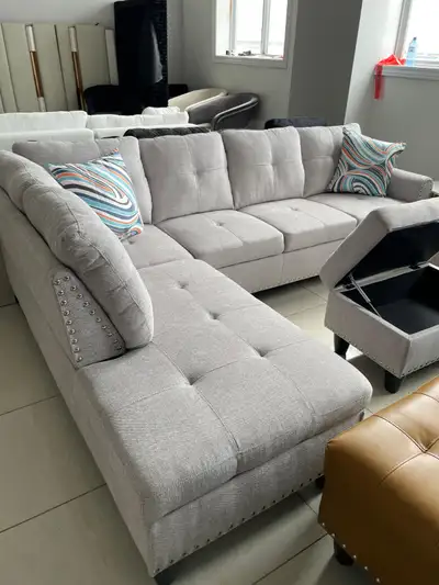 L shaped grey sectional sofa with ottoman, View more
