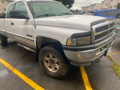 This is the holy grail, a cummins 12 valve, a 5 speed manual transmission, a 4x4, a Laramie edition,...