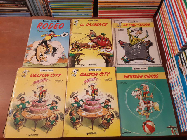 Lucky Luke Bandes dessinées BD Lot de 17 bd abîmées 2$ et + dans Bandes dessinées  à Laurentides - Image 4