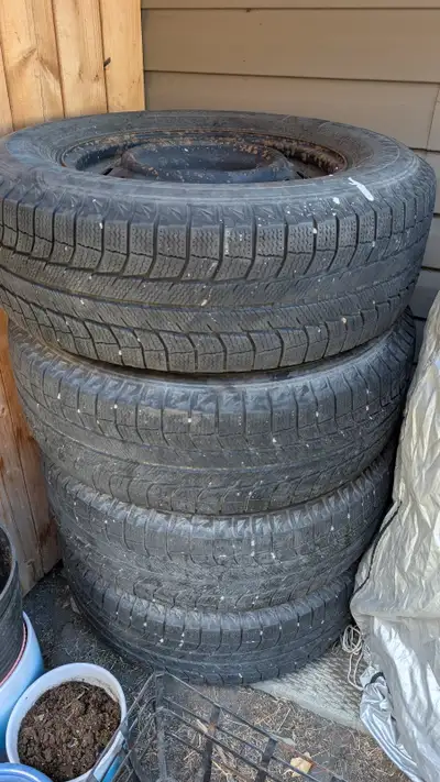 End-of-season steal! Full set of 4 winter tires on black steel rims, BC winter/mountain rated. Ready...